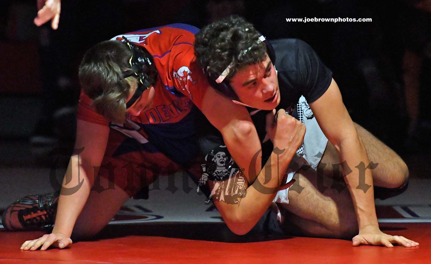 Wilmington’s Marcello Misuraca and Burlington’s Jaden Alford battle it out